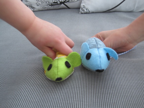 kids playing with fabric mice
